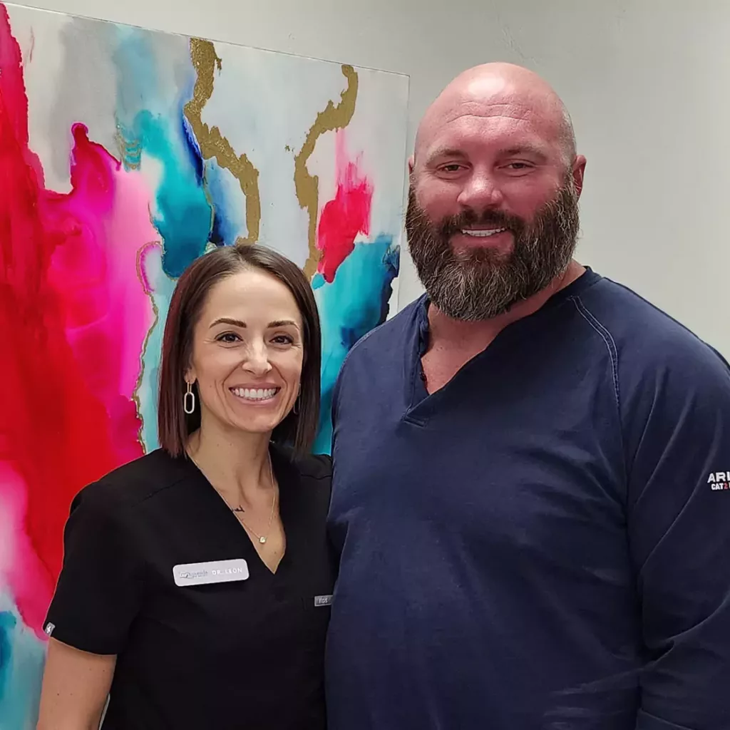 Dr. Traci Leon with a dental client.