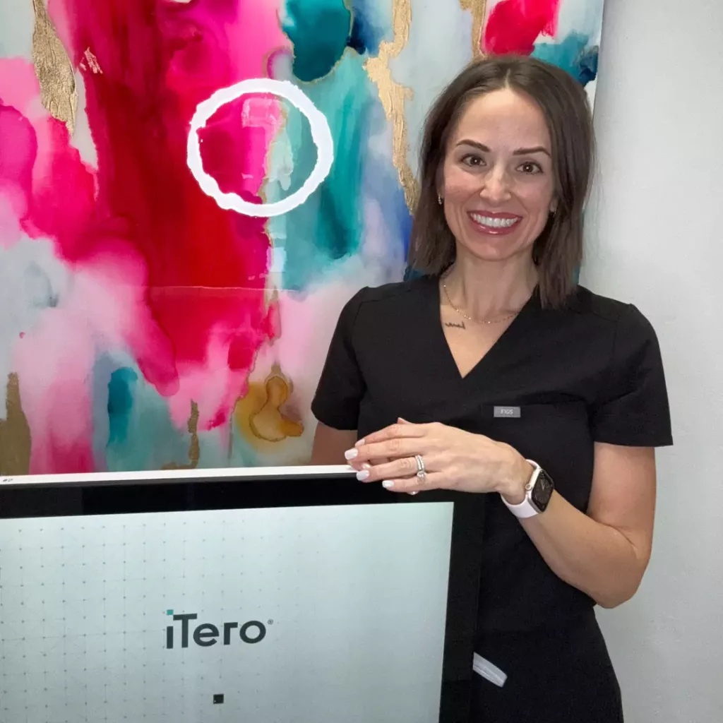 Dr. Traci Leon with the iTero™ Scanner